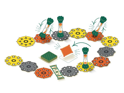 Quicksand game components including four green hourglasses, various yellow, orange, and grey circular tokens, and green cards depicting a game in progress