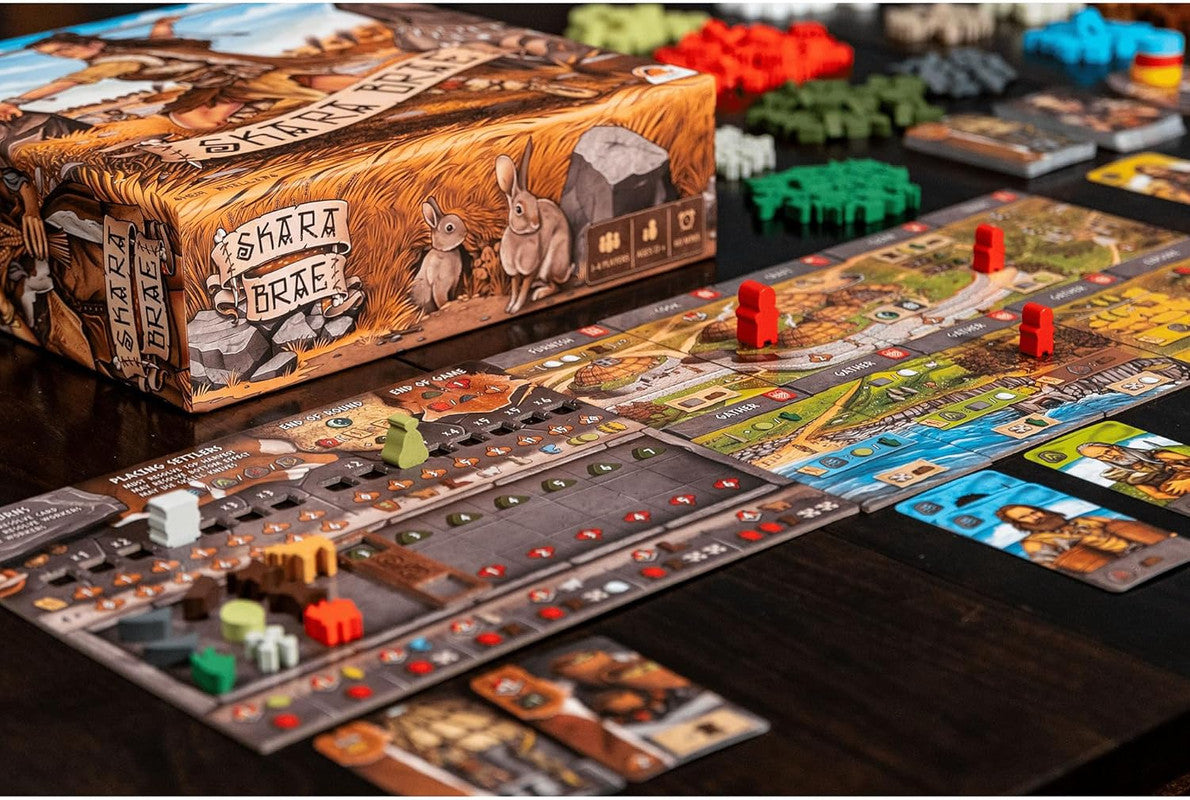 Board game Skara Brae set up with tokens, cards, and game boards on a dark table