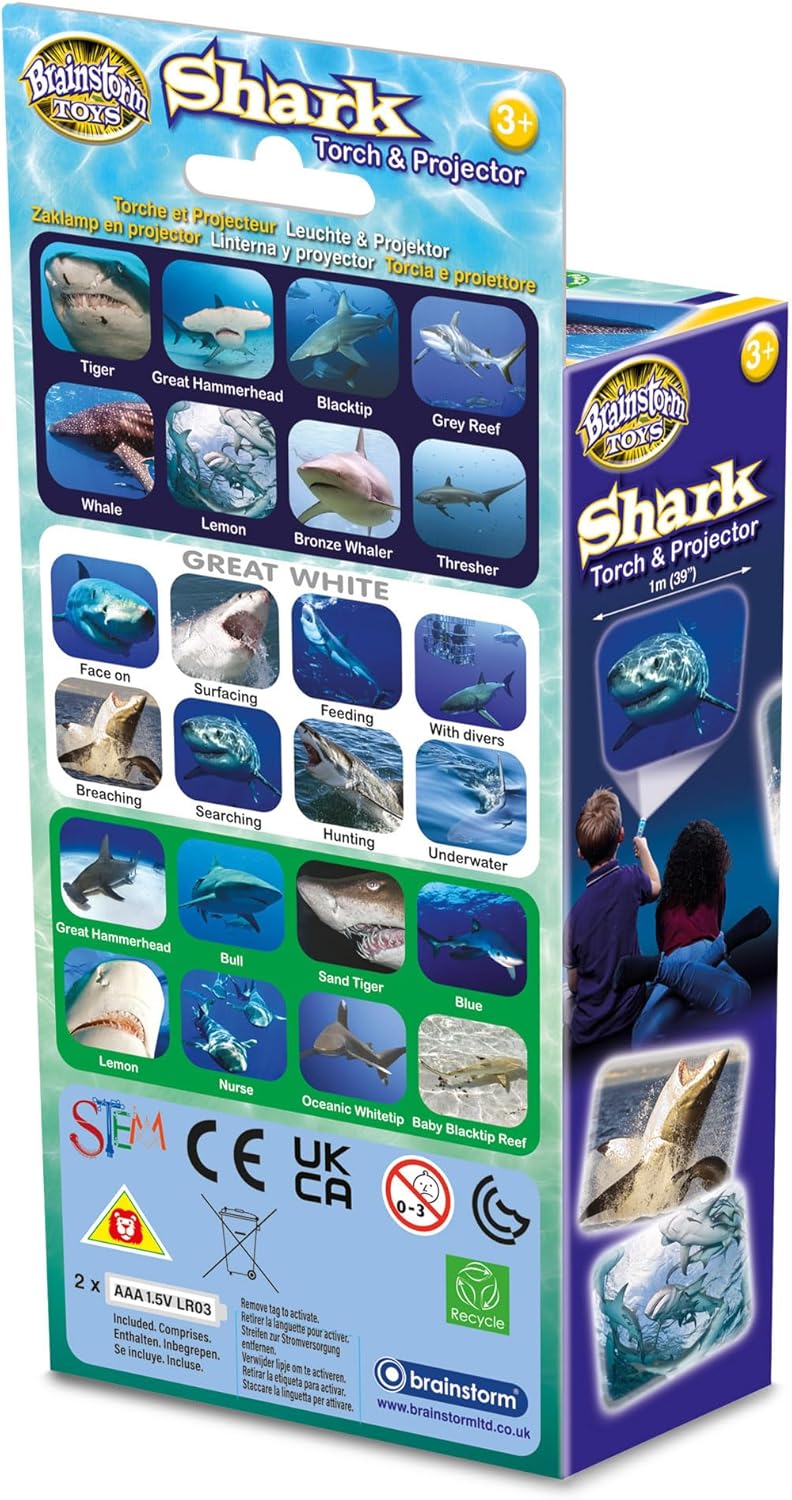 Product packaging for a Shark Torch & Projector toy, featuring photos of Great White, Tiger and Hammerhead sharks