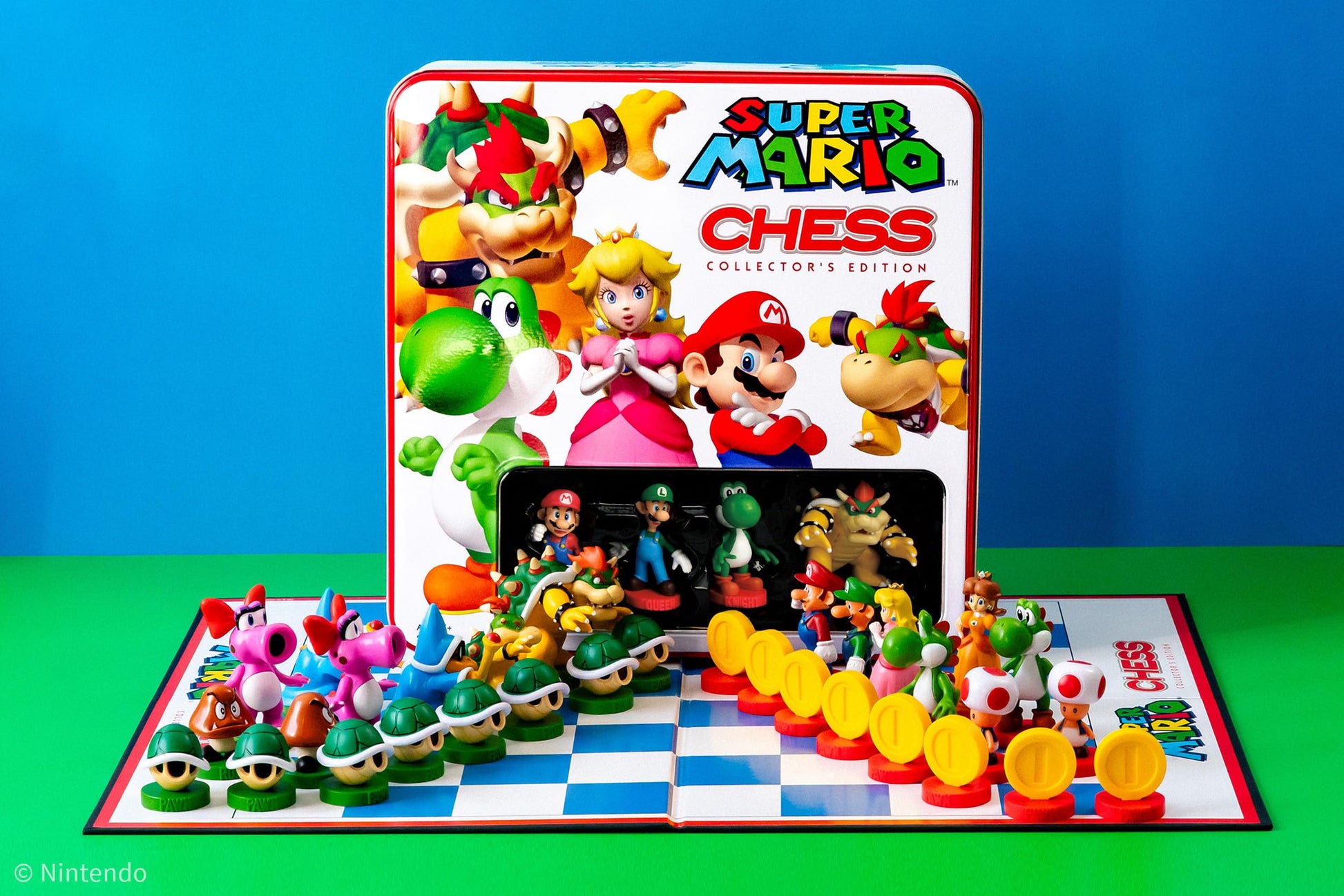 Super Mario Chess Collector's Edition with character pieces set up on a chessboard. The game box stands behind