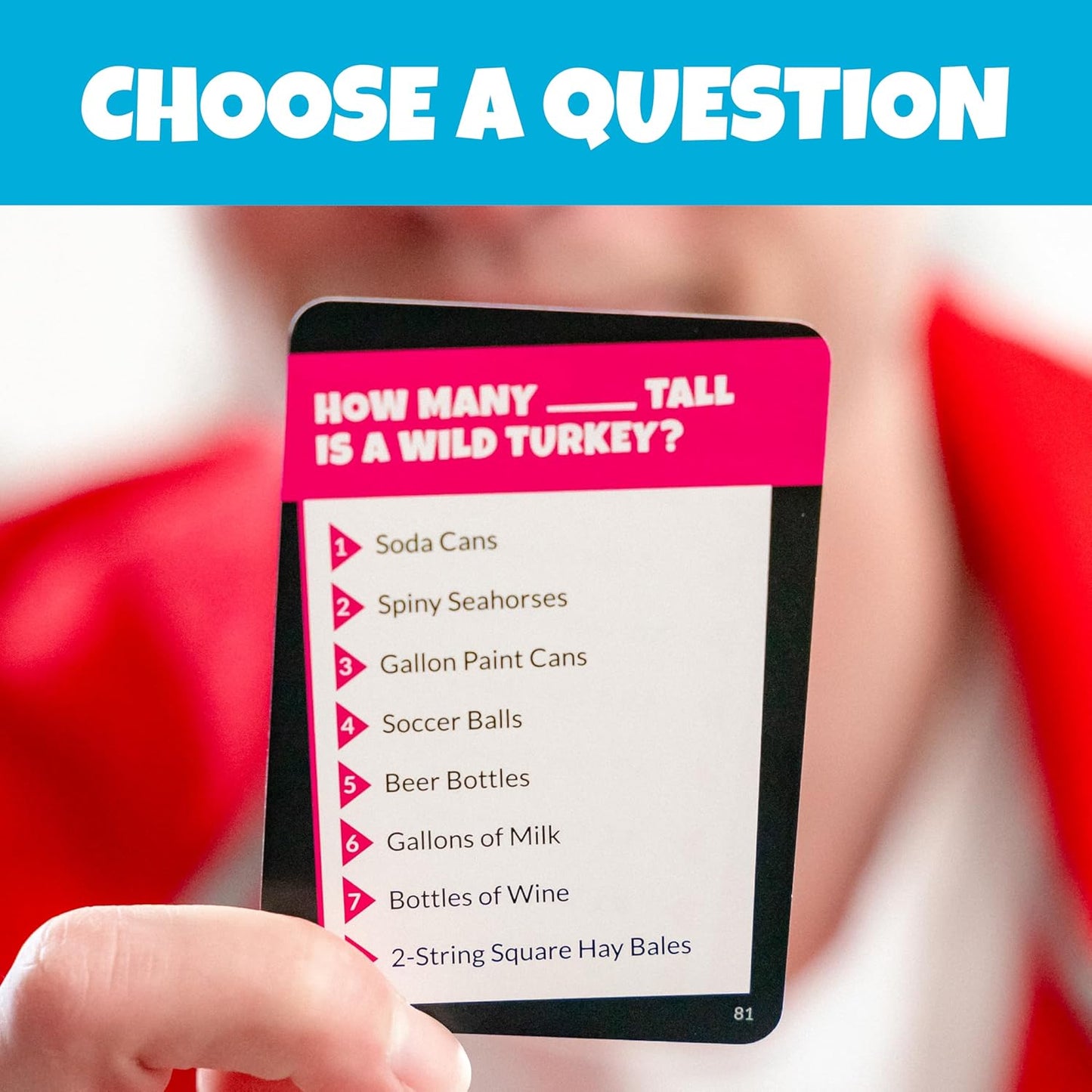 Hand holding a game card asking, "How many tall is a wild turkey?" Blue banner reads "CHOOSE A QUESTION"