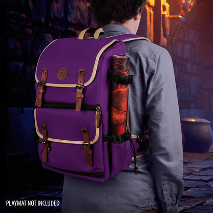 A person viewed from behind wears a purple backpack with a red rolled playmat attached, in a dark, fantasy alley.