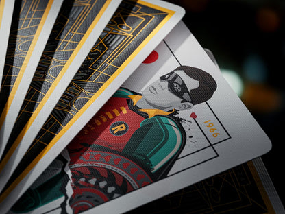 Fanned playing cards revealing a custom court card illustration of Robin the superhero, with black and gold backs