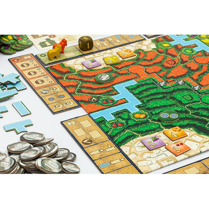 Alpujarras board game with a yellow wooden horse, a die showing '1', stacked coins, and a game board featuring fields and rivers