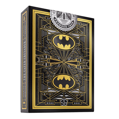 Black and gold premium playing card box for "The Caped Crusader" Batman deck, featuring two Bat-symbols