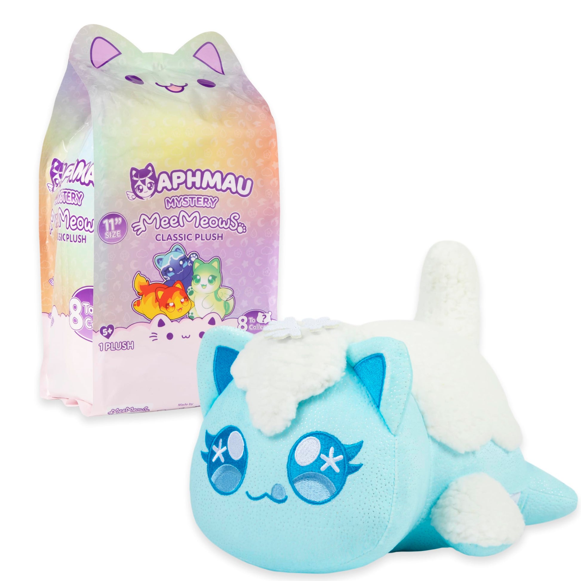 An 11-inch shimmering blue Aphmau Elemental MeeMeows plush with white fur rests beside its pastel gradient mystery bag