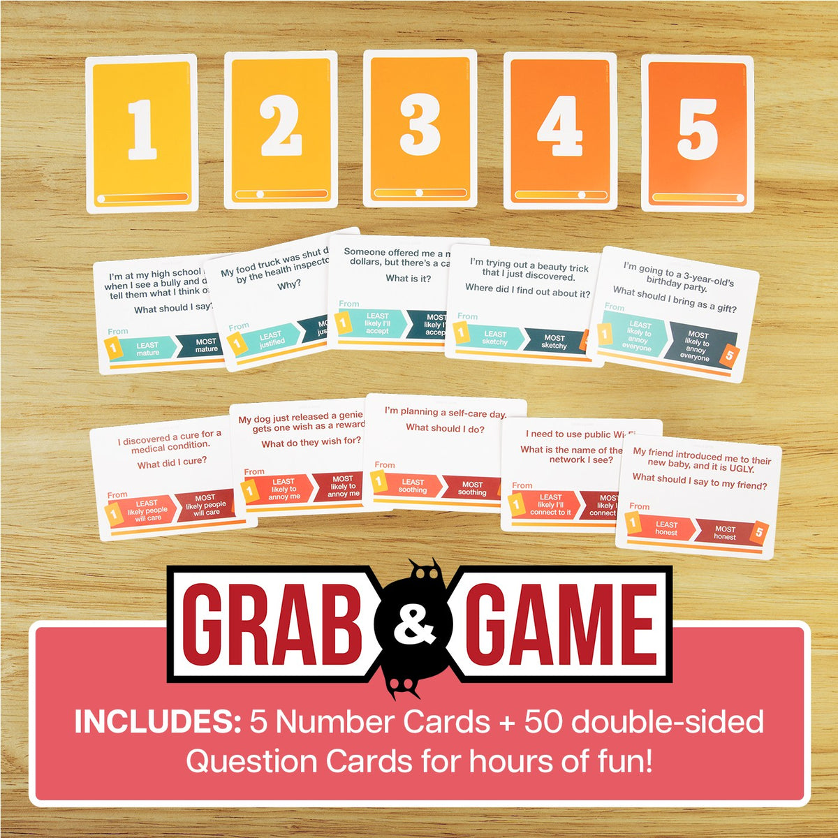 The Grab &amp; Game board game components include five yellow numbered cards, many white question cards with Least and Most options, and the game box on a wooden table