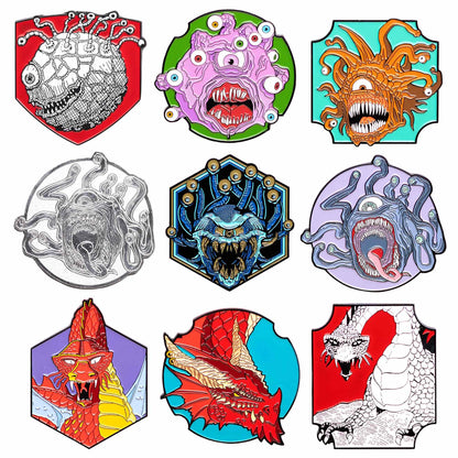 Nine enamel pins from the Dungeons and Dragons Monster Mystery Pin Box showing six different Beholder monsters and three different dragon designs