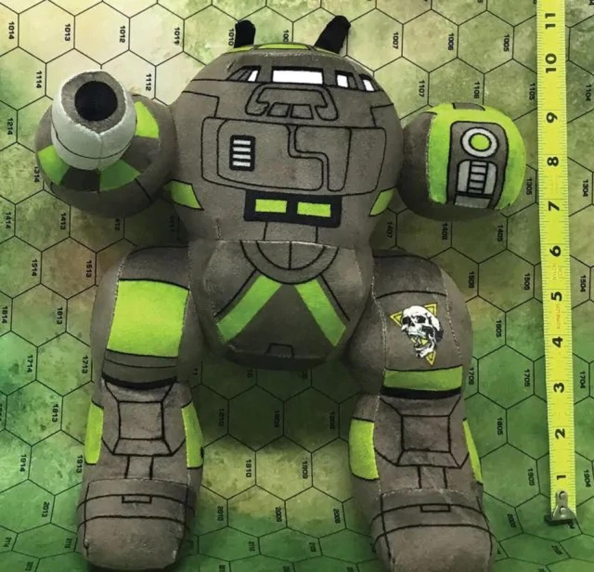 Battletech Mech plush toy in brown with lime green accents and black detailing