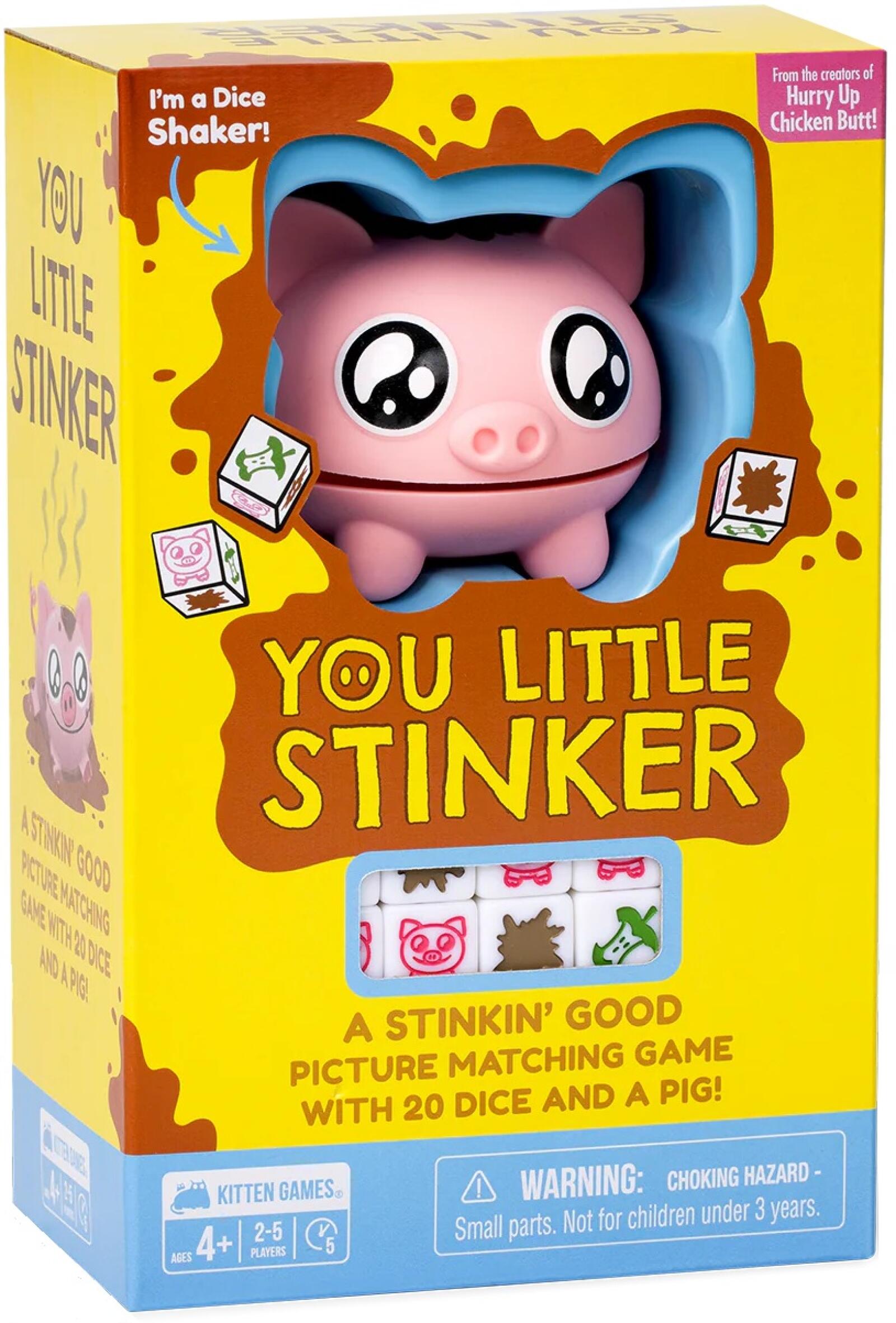 You Little Stinker board game box, featuring a pink pig dice shaker, mud splatters, and game dice