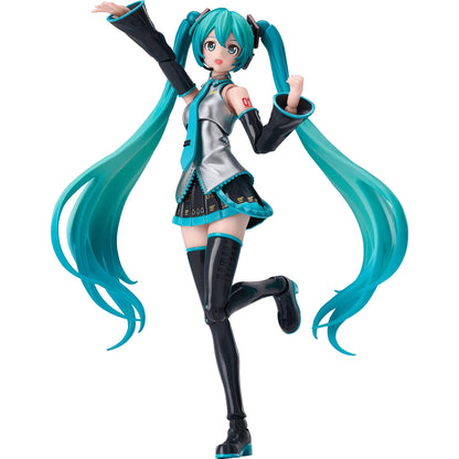 A Blokees Hatsune Miku action figure is shown mid-step with one arm raised, featuring her metallic top, detailed skirt, and long vibrant teal pigtails