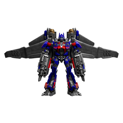 Detailed Jet Wing Optimus Prime figure in blue and red armor stands forward facing displaying massive dark gray wings and powerful forearm blasters