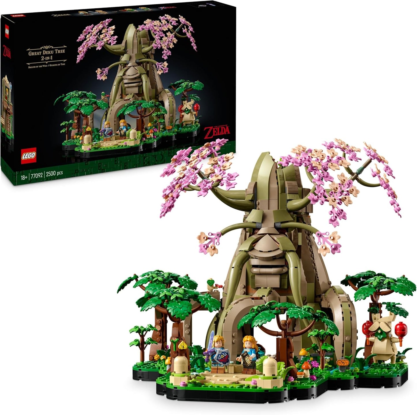 LEGO Great Deku Tree model with pink cherry blossoms, Link and Zelda minifigures, shown beside the box