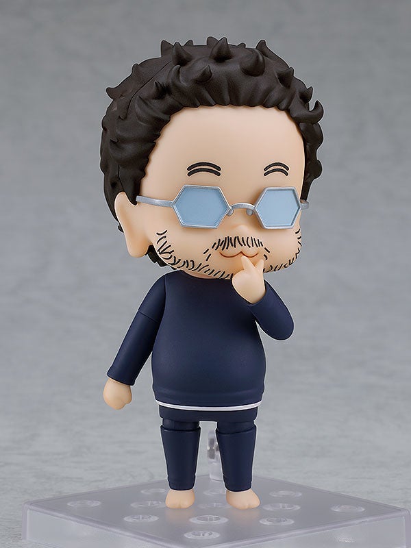 Nendoroid Kantoku-Kun posed sitting with sketchbook Insufficient Direction