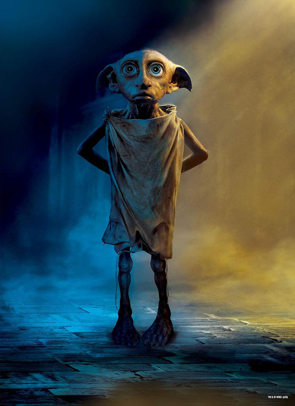 Dobby the house-elf stands, looking up with wide, blue eyes, wearing a tattered pillowcase. Backlit by blue and yellow light