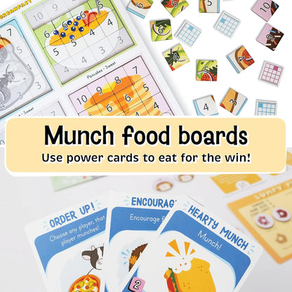 Munch food board game showing cards and numbered boards with illustrations of pancakes cereal and other foods