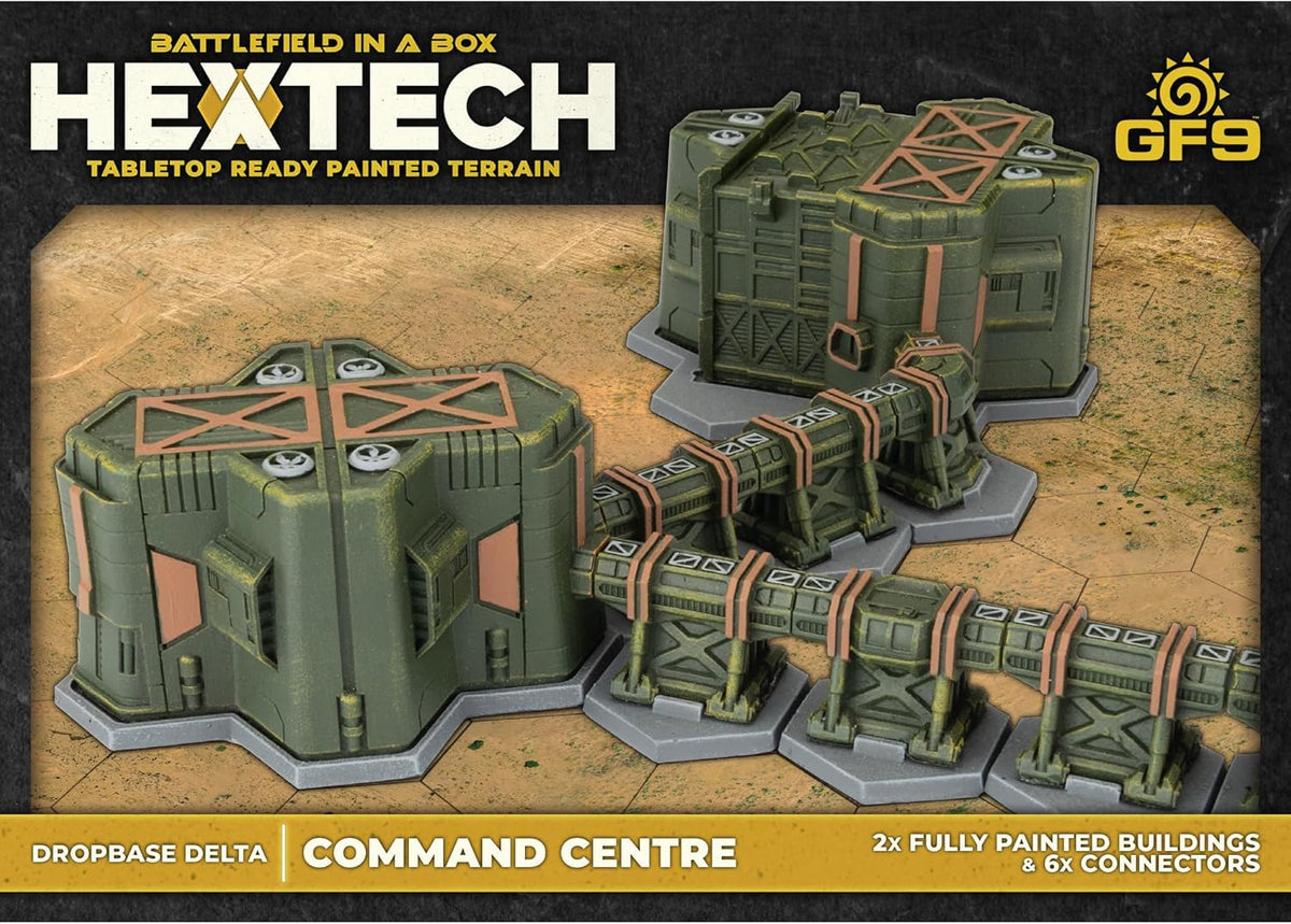 Hextech tabletop terrain: Two olive green command buildings linked by six elevated conduits on a desert game mat.