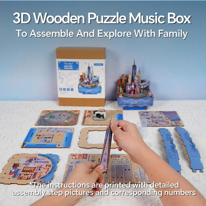 Hands assembling wooden pieces of a 3D New York skyline music box puzzle