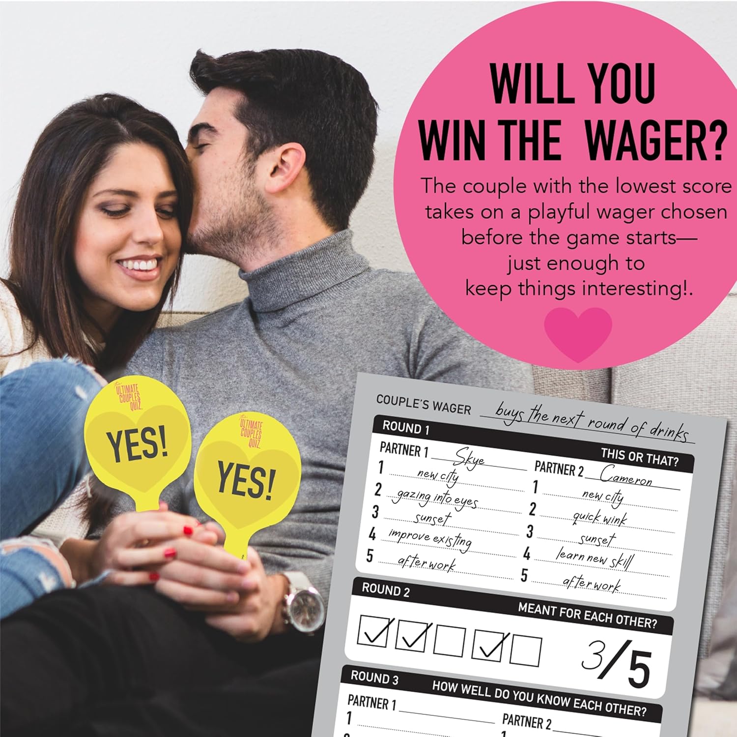 Man kisses smiling woman's cheek; they hold yellow "YES!" paddles next to a couples quiz scorecard