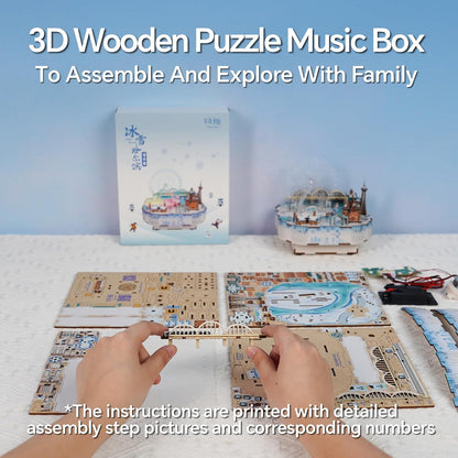 Hands assembling a wooden bridge piece from a 3D puzzle music box kit, surrounded by unassembled sheets