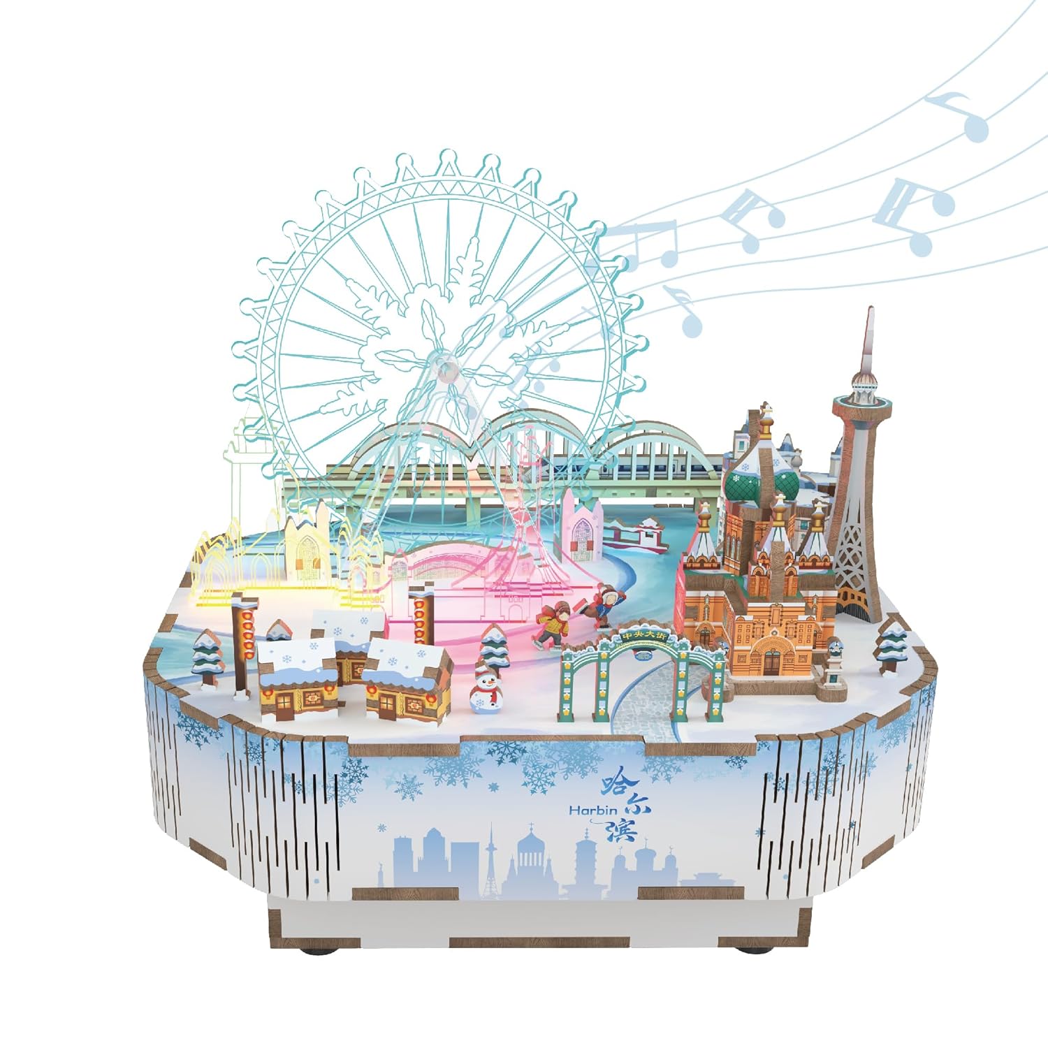 Illuminated miniature winter cityscape model featuring a large Ferris wheel and Russian-style cathedral