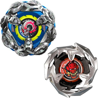 Two metallic Beyblade X battle tops, one blue and one red, featuring detailed dragon and ram designs