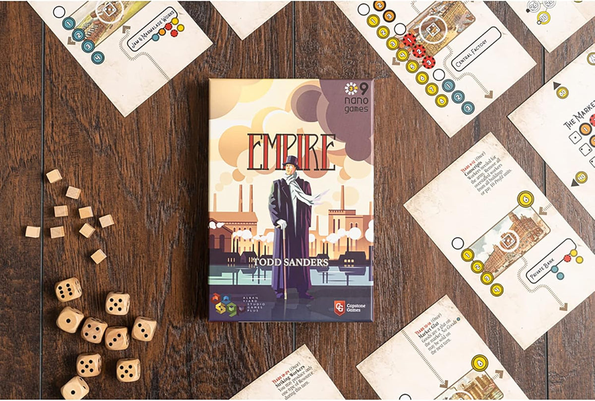 Game setup with cards, wooden dice, and cubes on a wooden table