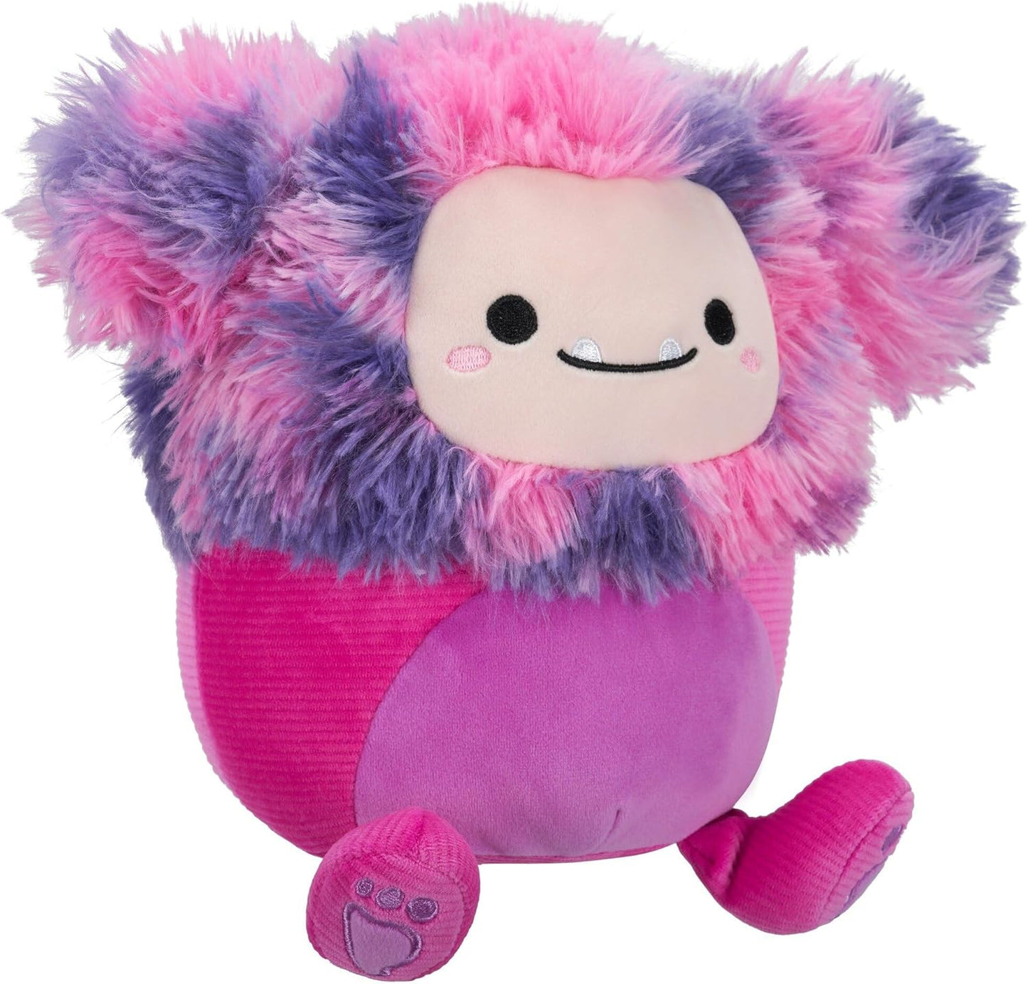 A sitting, fluffy pink and purple stuffed monster toy with small fangs