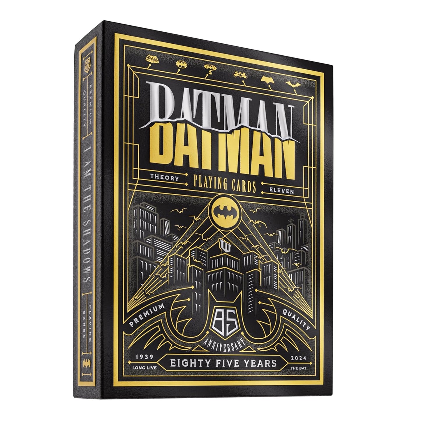 Black and gold Batman 85th Anniversary playing card deck box, featuring the Gotham skyline and logo