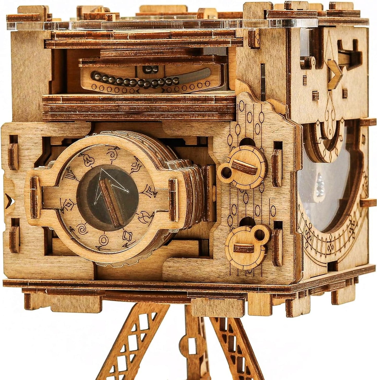 Intricate wooden mechanical Sherlock's Camera model kit with engraved dials, clear windows, and visible moving components on a stand