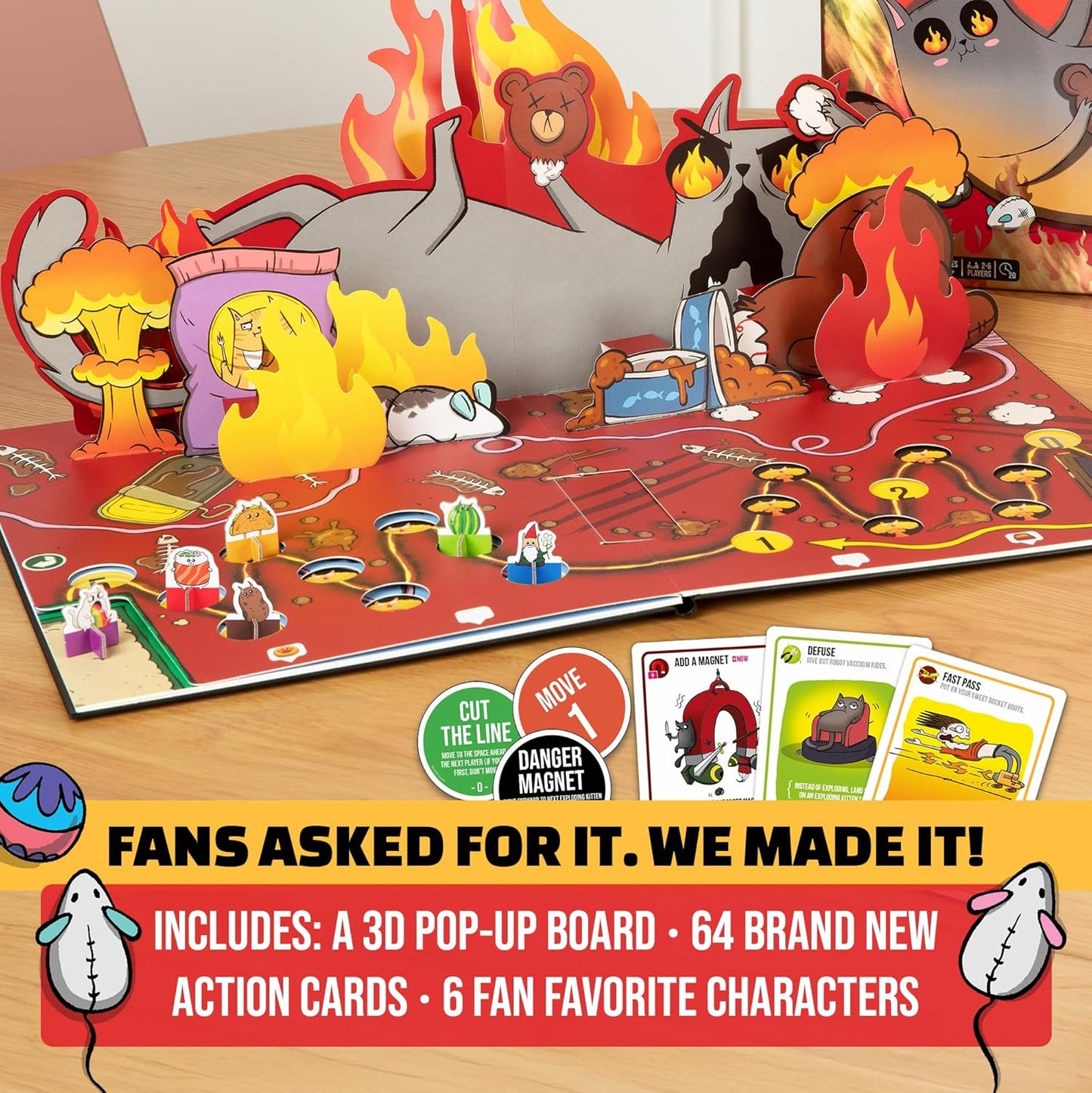A chaotic 3D pop-up board game featuring a fiery gray cat, explosions, character standees, and action cards
