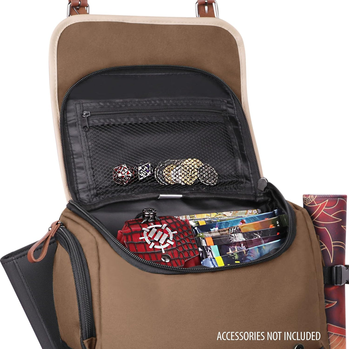 An open brown backpack showing dice, a red case, and game cards inside, with a rolled mat strapped to the side.