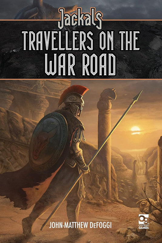 Jackals Travellers on the War Road RPG book cover featuring a soldier in Greek-style armor with shield and spear standing on a rocky path before ancient ruins