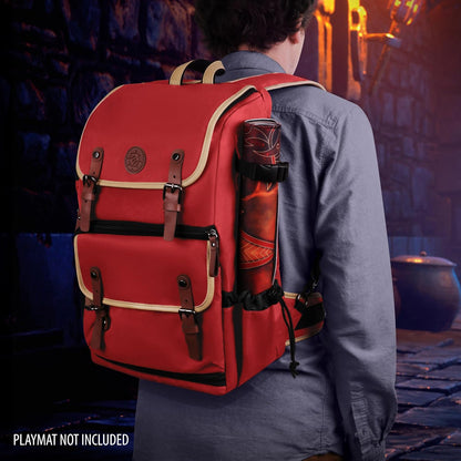 A person from behind wears a red backpack with tan trim and an attached rolled-up playmat, walking in a dark fantasy corridor.