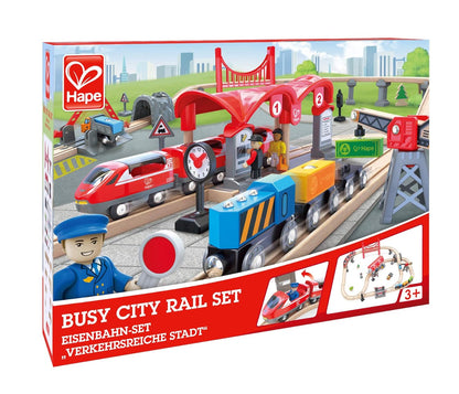 Hape "Busy City Rail Set" box showing a detailed wooden train, station, and figures on tracks