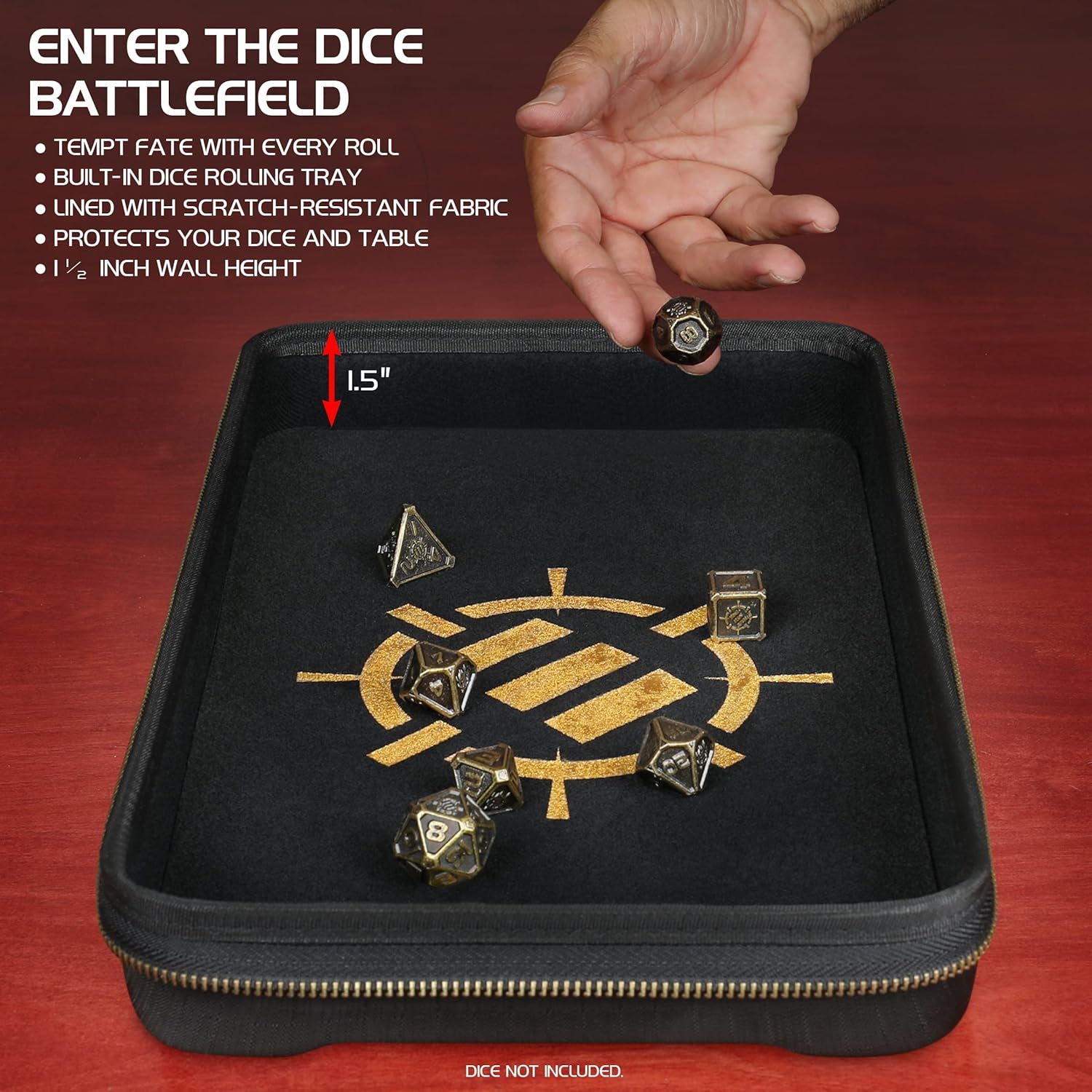 A hand drops a metal die into a black, zippered dice rolling tray with a gold symbol and several other dice