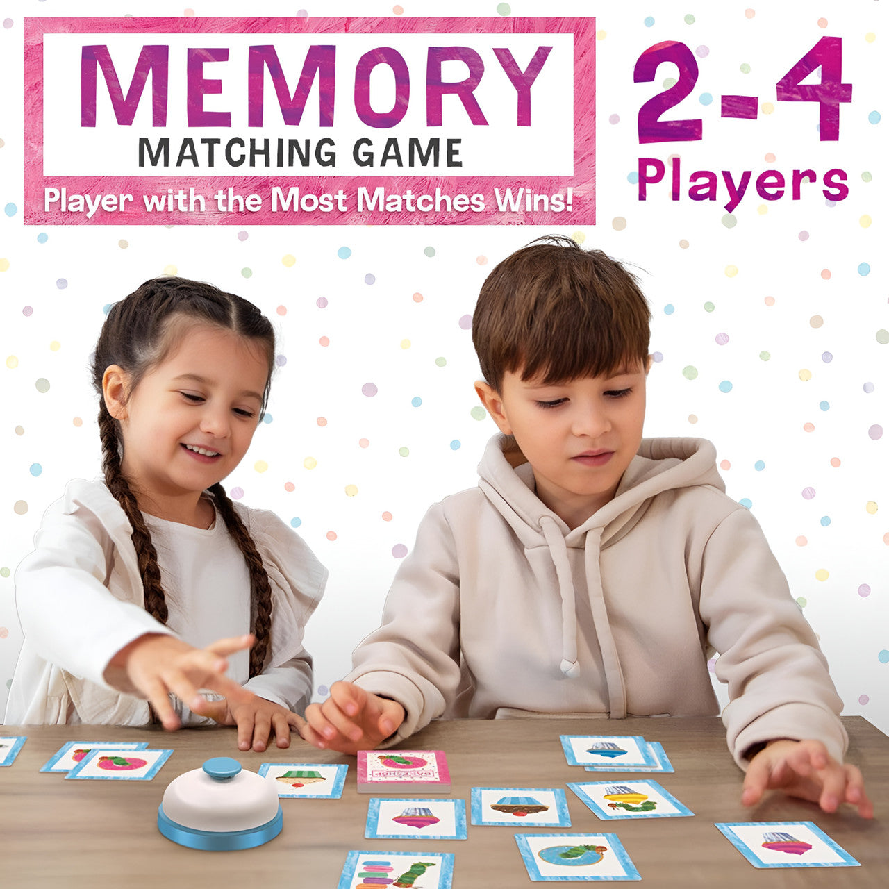 Children playing the Memory Matching Game, reaching for cards and the bell