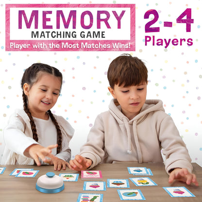 Children playing the Memory Matching Game, reaching for cards and the bell