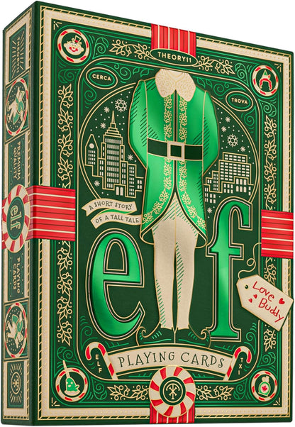 Ornate green and gold Elf movie playing card tuck box featuring Buddy's iconic coat and New York cityscapes
