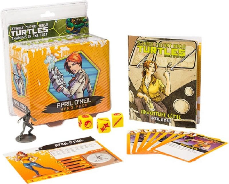 Components of a Teenage Mutant Ninja Turtles Shadows of the Past Hero Pack including its box, a figurine, dice, character card, adventure comic, and game cards