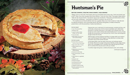 Insight Editions Disney Villains cookbook page displays a golden Huntsman's Pie with a red heart, a slice cut to reveal the meaty filling, on a wood board beside the recipe