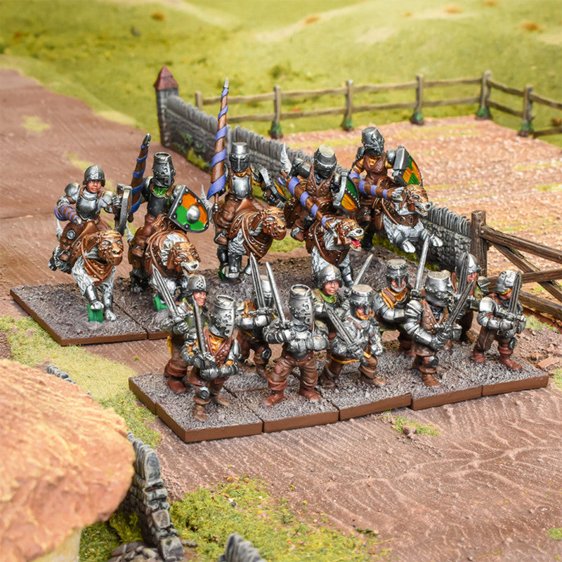 Close-up view of Kings of War Halfling Stalwarts miniatures in battle-ready poses