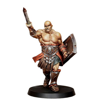 A miniature Julius figure depicts a bald muscular warrior with a raised sword and shield, wearing ancient armor with a skull belt
