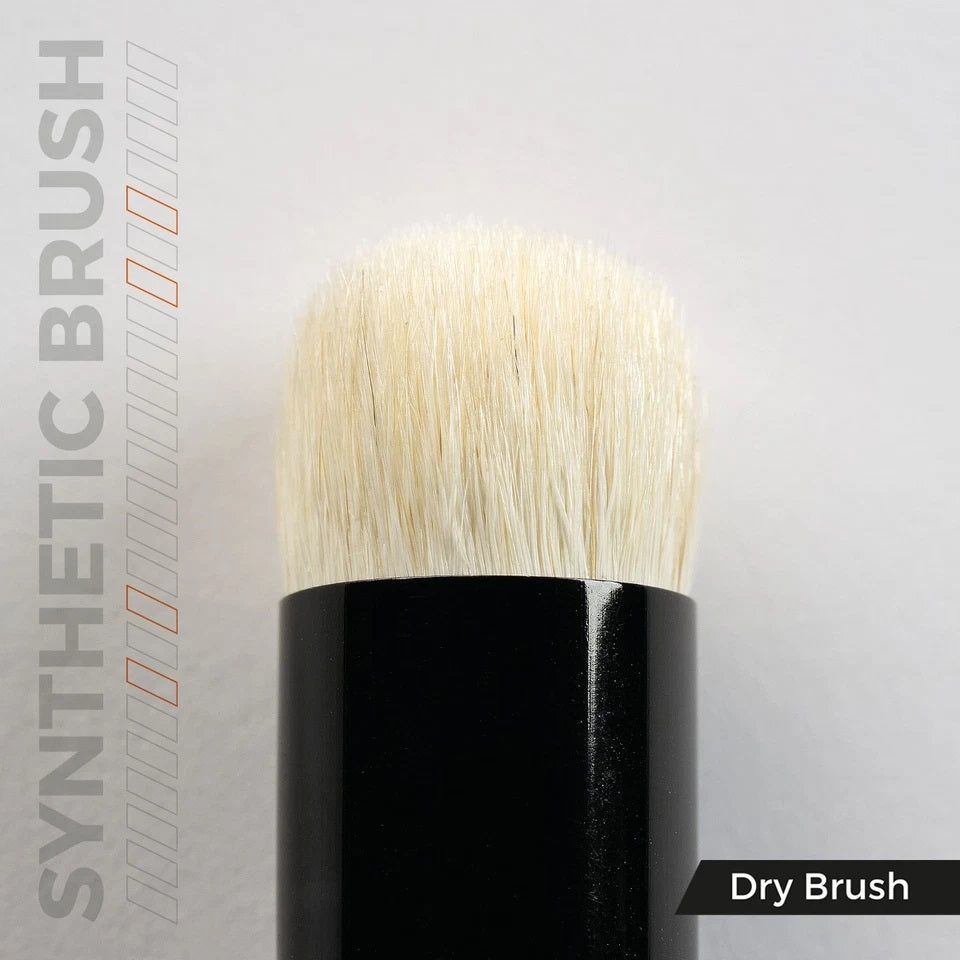 Close-up of a dry synthetic brush head, featuring dense cream-colored bristles and a black ferrule