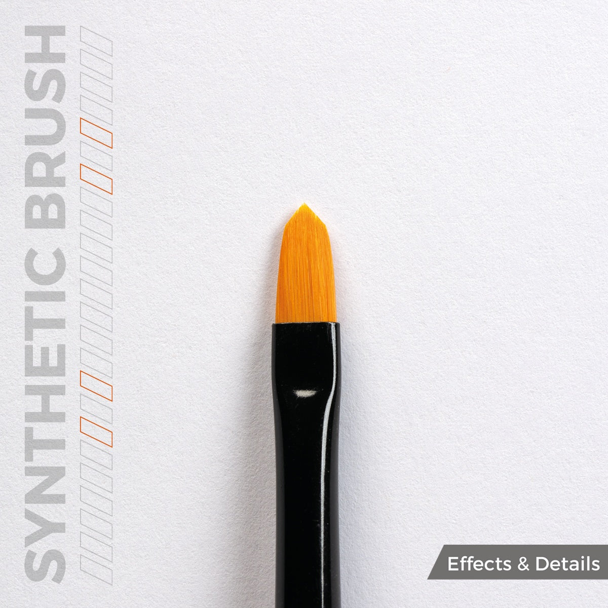Close up of an orange synthetic brush with a black handle against a textured white background
