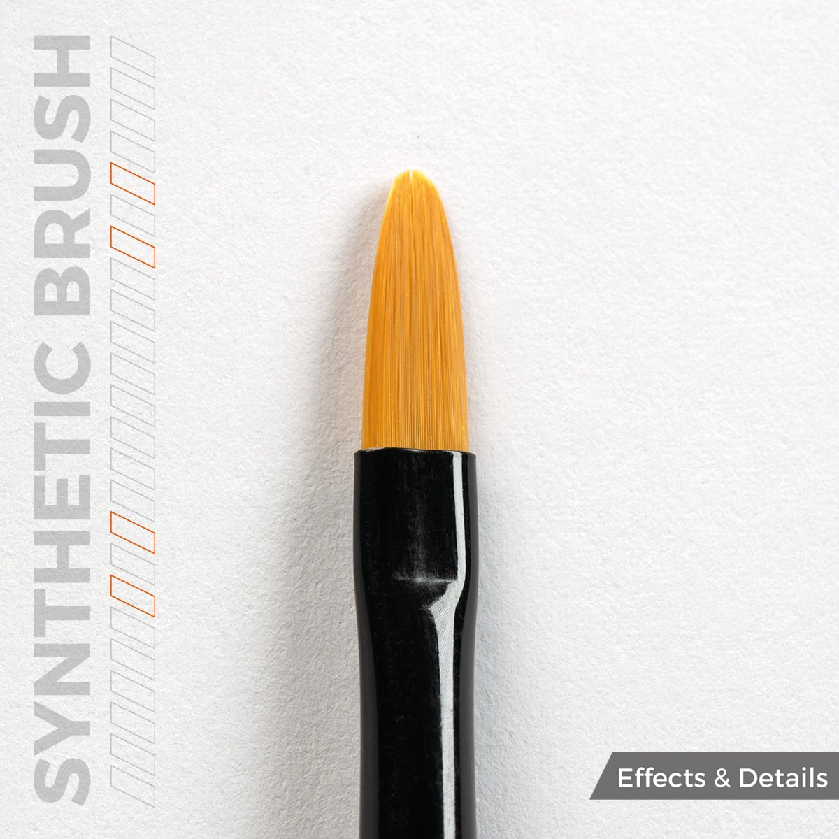 A close-up of a synthetic brush with bright yellow bristles and a black handle