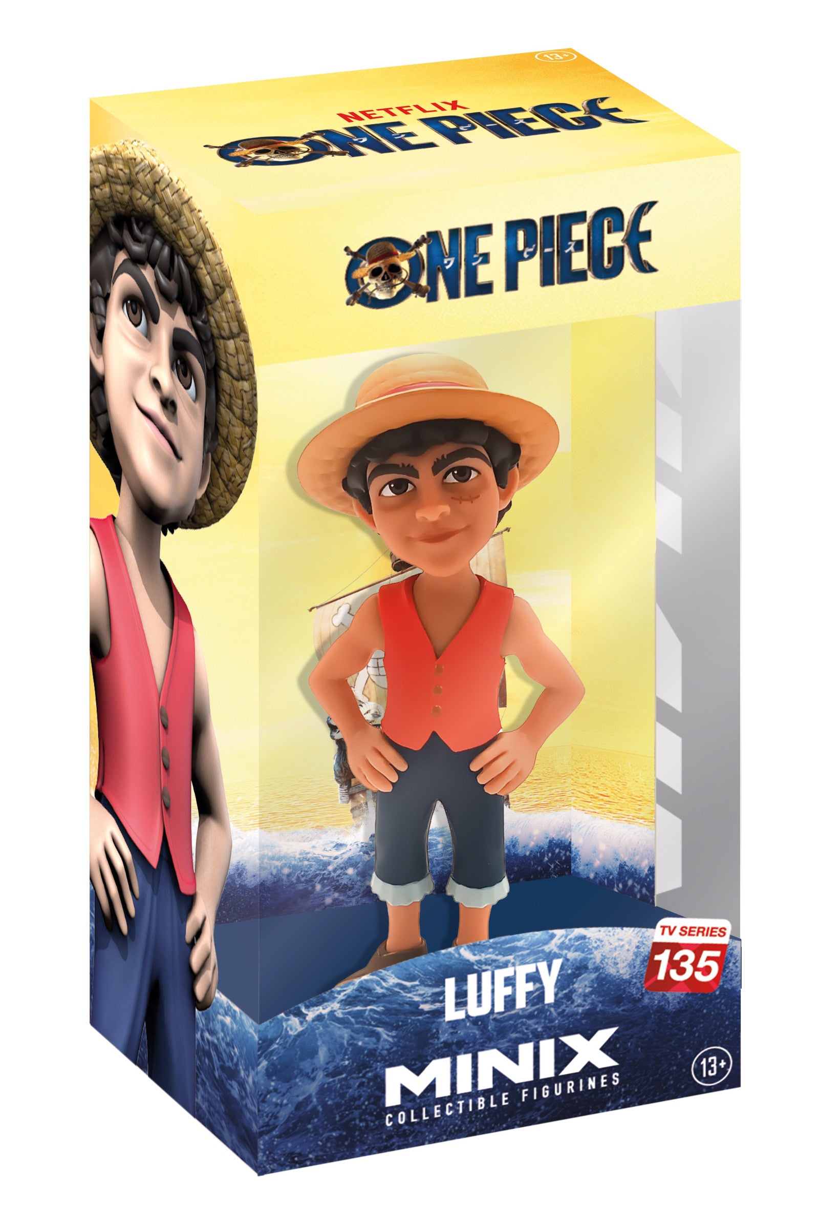 Front view of Luffy figure grinning widely, wearing red open shirt, blue shorts, and signature straw hat