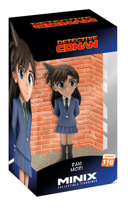 Front view of Rachel Moore figure in blue school uniform with white shirt and green tie