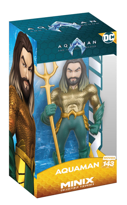 An Aquaman figure in its clear packaging, depicting the character with long dark hair, a beard, gold armor, green pants, and a golden trident