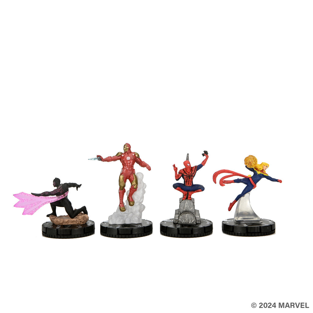 Four Marvel hero miniatures: Black Panther, Iron Man, Spider-Man, and Captain Marvel in action poses